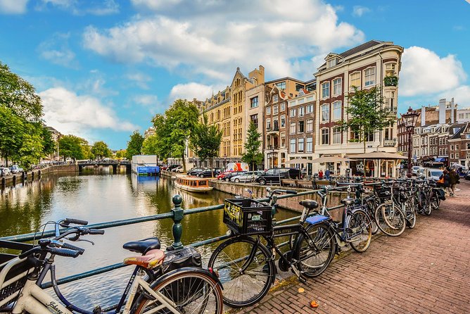 Private Tour: Amsterdam City Walking Tour and Canal Cruise - A smart first-day combo: walking orientation plus a canal cruise