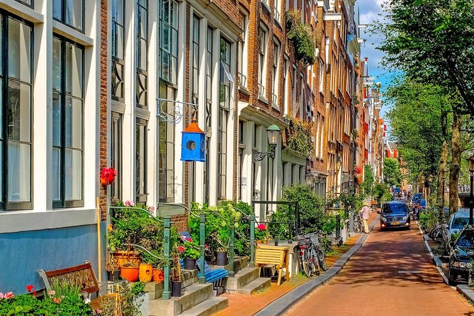 Private Tour: Amsterdam City Walking Tour and Canal Cruise - Jordaan district vibes and the West Kirk stop near Anne Frank House