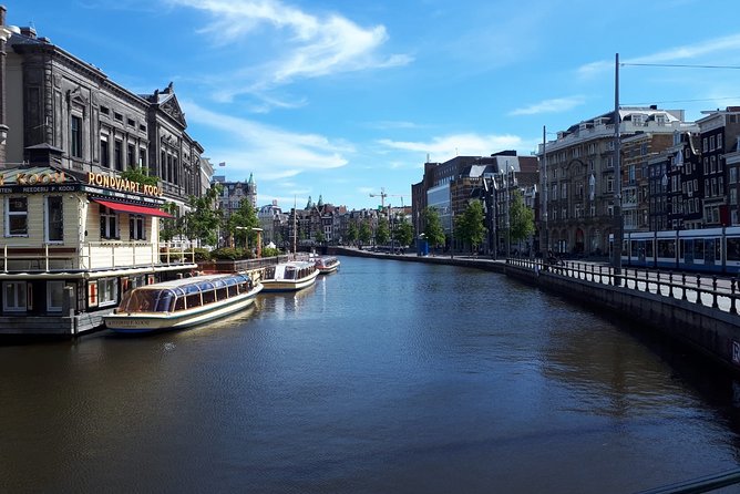 Private Tour: Amsterdam City Walking Tour and Canal Cruise - Leidseplein and the Museum District: where the pace changes