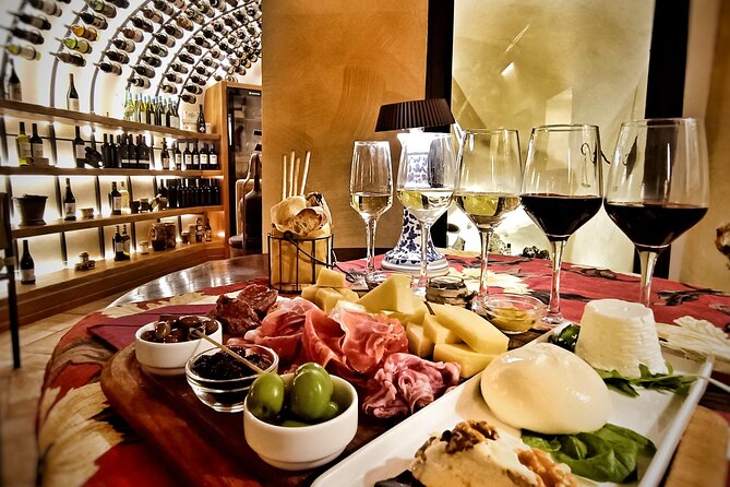 Rome Tiber River Ride and Top Food Tasting with Wine Pairing - Fabullus Wine Cellar: food, wine, and an ancient cistern vibe
