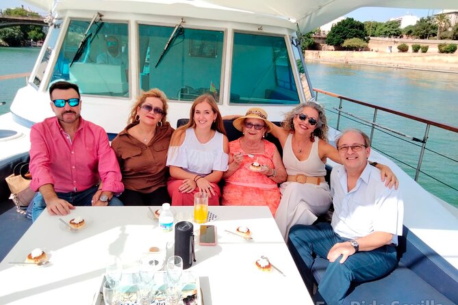 Seville: Cruise along the Guadalquivir River with appetizer - The Guadalquivir view list: bullring, Giralda details, Alamillo bridge, and Expo 92