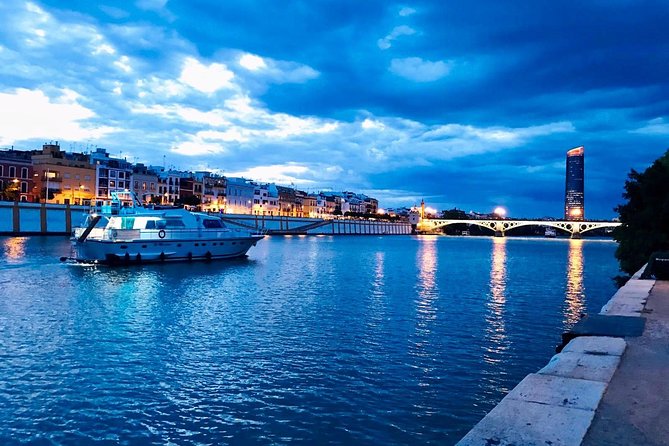Seville: Cruise along the Guadalquivir River with appetizer - Best times to go: when sunset lights up the bridges