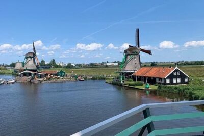 Zaanse Schans Giethoorn Private Tour from Amsterdam Canal Cruise - From Amsterdam to Zaanse Schans: Windmills, River Zaan, and Photo Stops